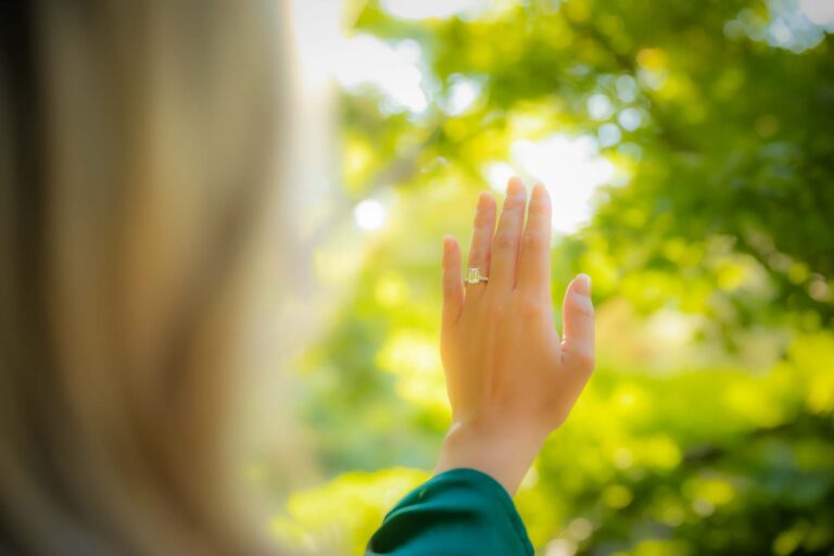 engagement ring on ring finger